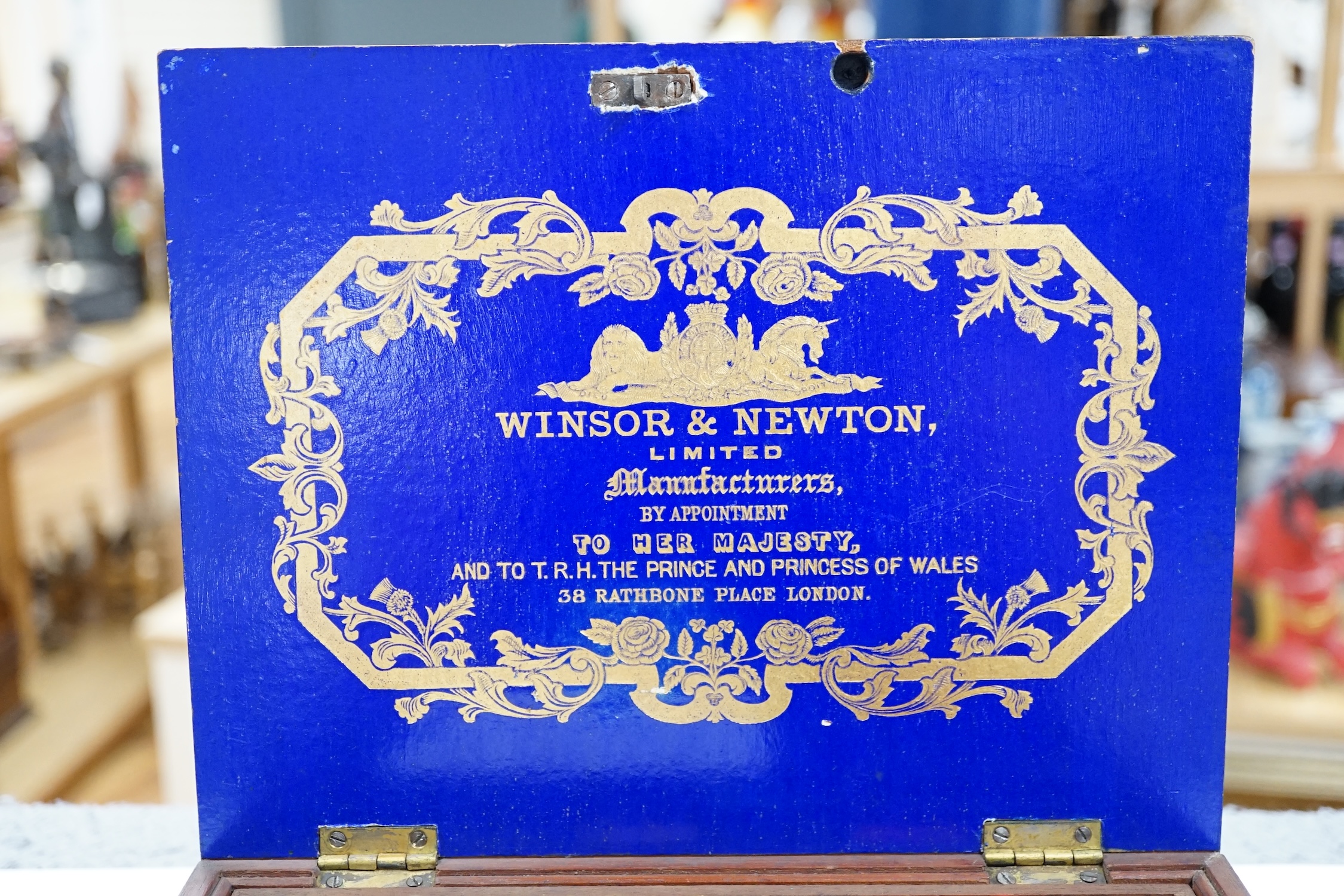 A Victorian Winsor and Newton artist's box with watercolour blocks, palettes etc. with key. Condition - fair
